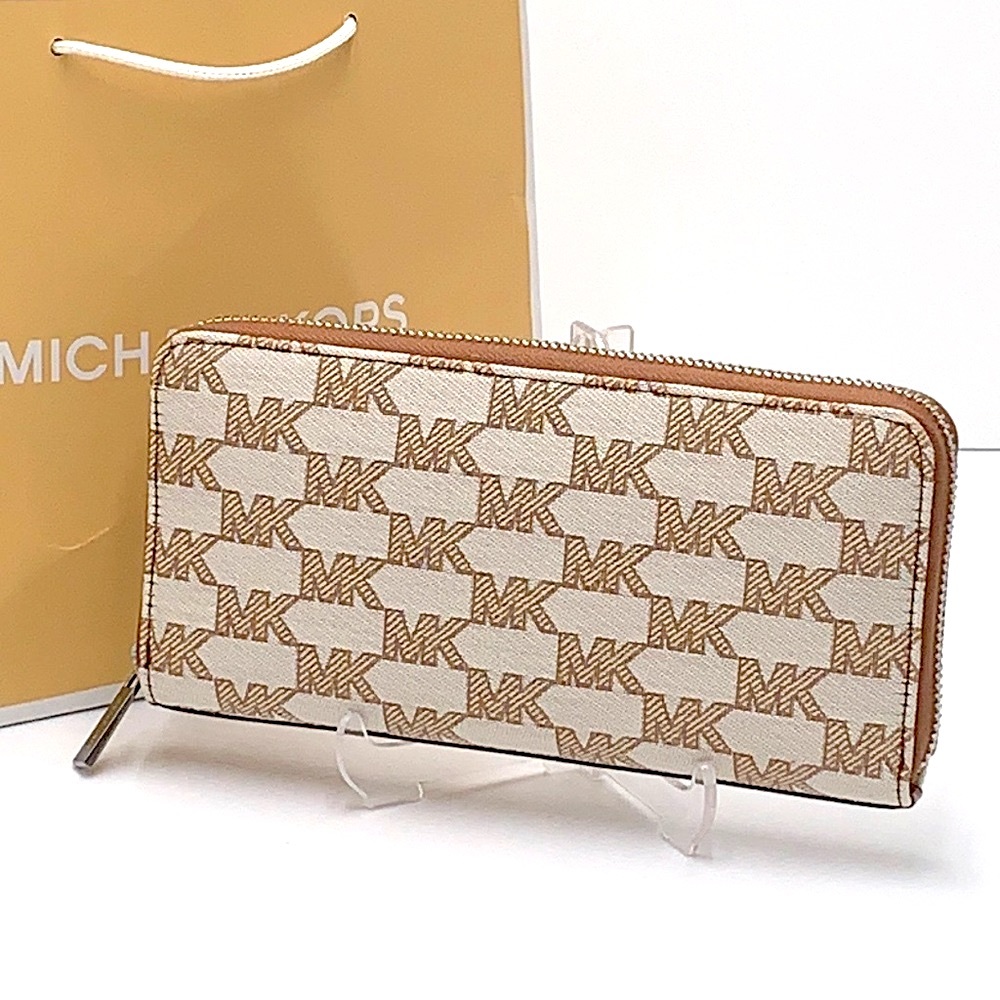 Michael Kors Men’s Women’s Cooper Tech Zip Around Continental Wallet
Light Cream